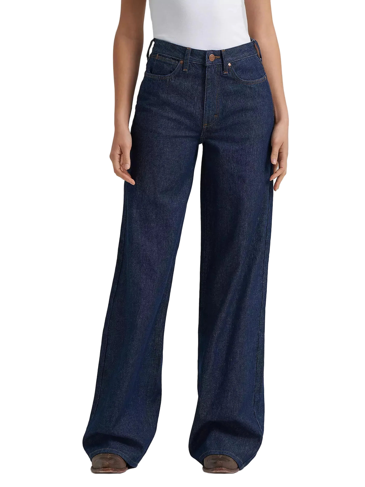 Dark blue jeans worn by a person on a light gray background
