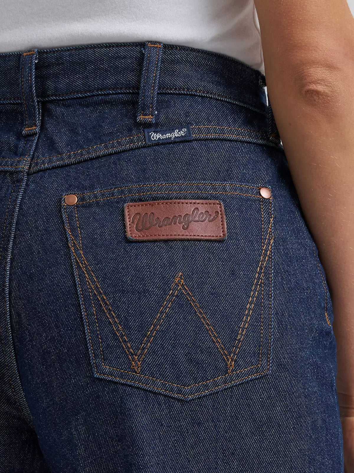 Close-up of Wrangler jeans with brand logo on pocket