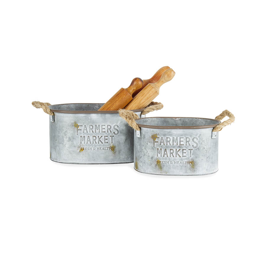 Nested Farmers Market Planter Set of 2. Two metal 'Farmers Market' bins with wooden handles on a white background