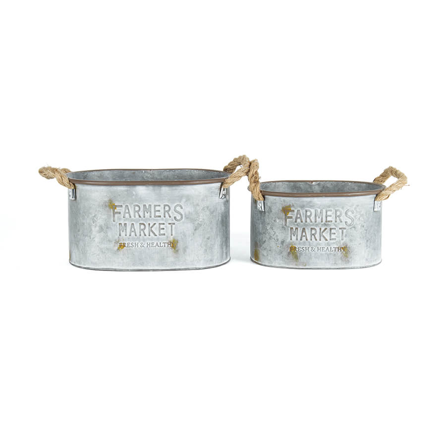 Nested Farmers Market Planter Set of 2. Two metal planters with 'Farmers Market' text on a white background