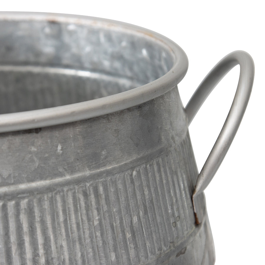 Nested Chic Barrel Pot Planter Set of 2. Close-up of a galvanized metal bucket with a handle on a white background
