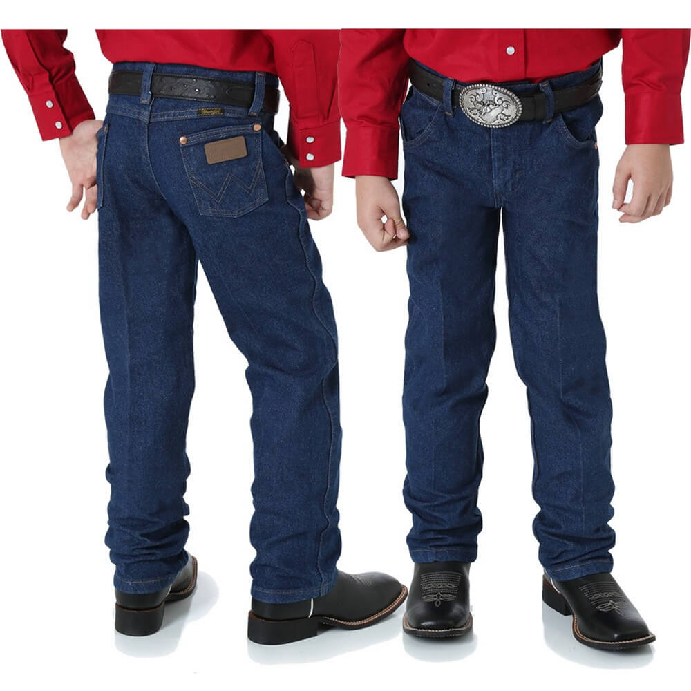 A pair of Wrangler boy's slim fit pro rodeo jeans, showing the front and back view. The jeans are dark blue, and the image displays a young male model wearing a red shirt and black shoes.