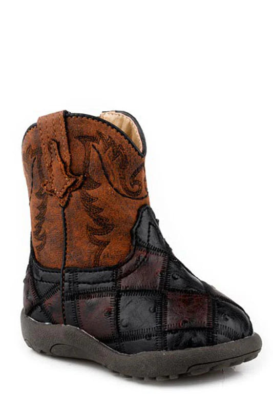 Roper Cowbaby Bird Blocks Infant Western Boot. Children's cowboy boot with brown leather top and black patchwork sole on a white background