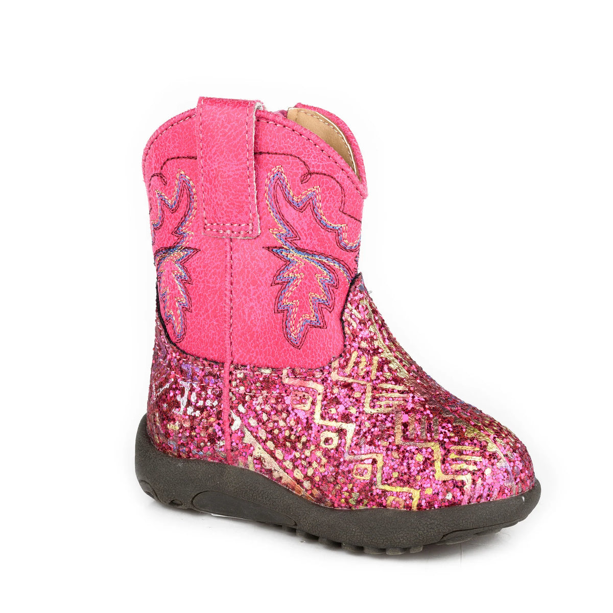 Pink glittery cowboy boot with decorative patterns on a white background
