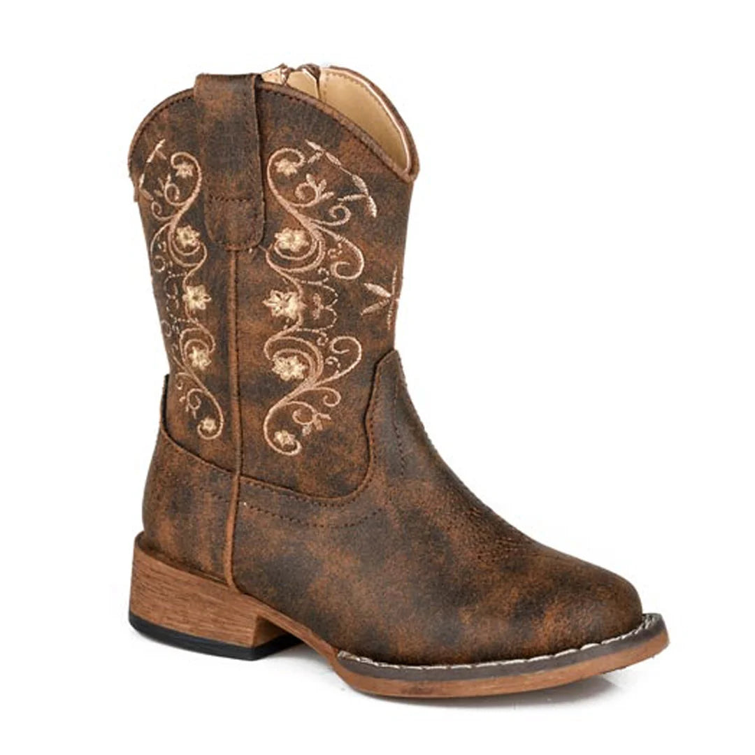 Brown cowboy boot with floral embroidery on a white background