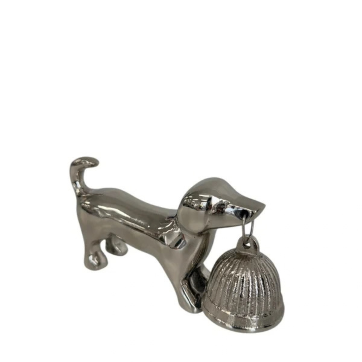 A polished silver dog figurine holding a small bell in its mouth, photographed against a plain white background.