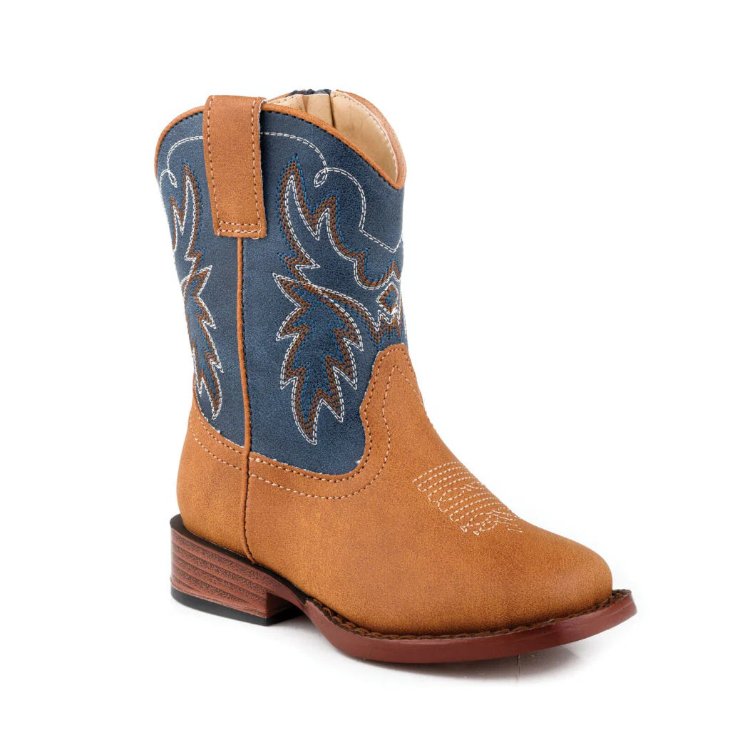 Child's cowboy boot with blue top and brown bottom on a white background