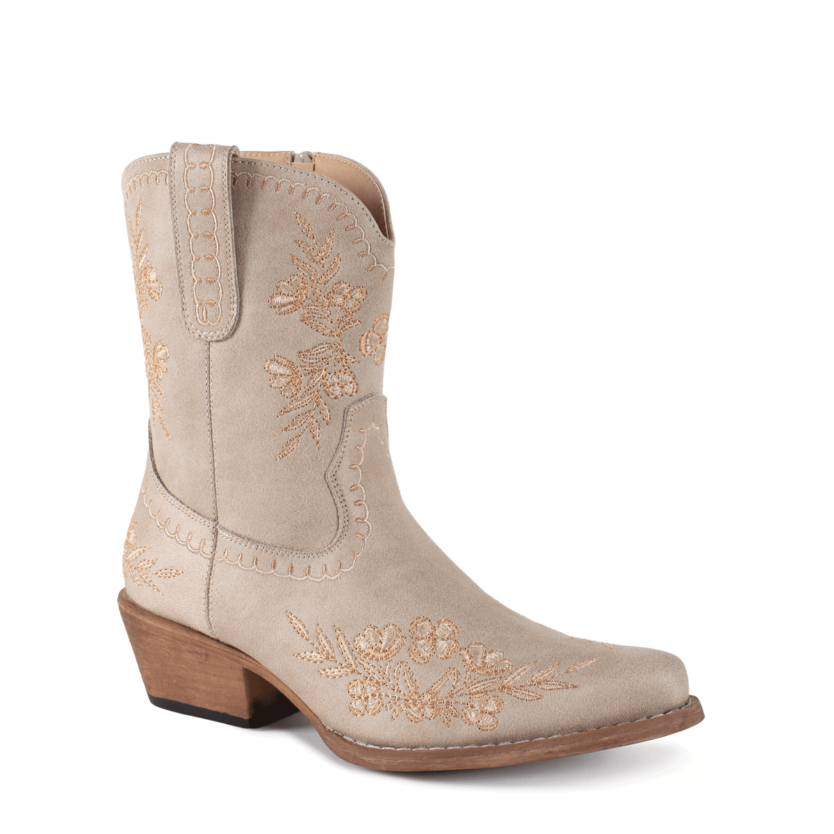 A light beige suede western boot with tan floral embroidery and a brown stacked heel, shown against a plain white background.