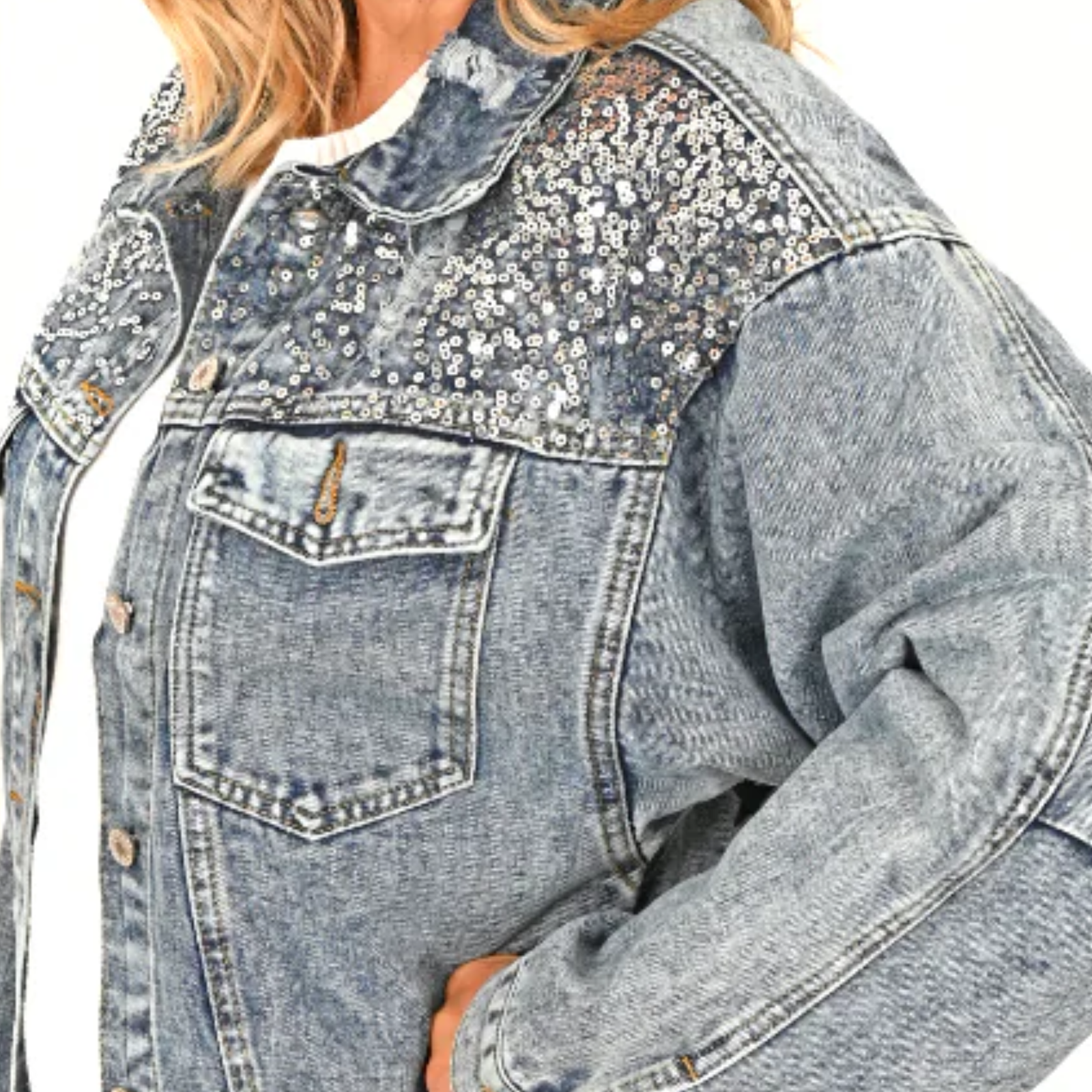 Denim jacket with sequin embellishments on a white background