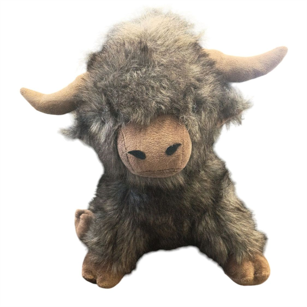 A fluffy highland cow plush toy with shaggy gray-brown fur, tan horns, and a tan snout, sitting against a plain white background.