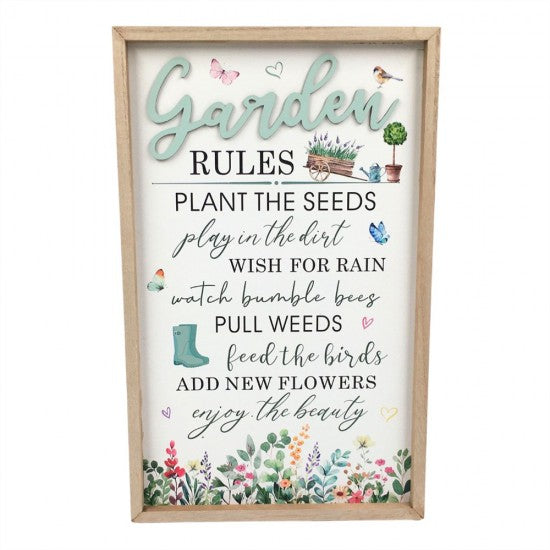 A framed garden sign with a light wood frame and white background, featuring the word 'Garden' in large mint script at the top and a list of rules in black and cursive text below. The sign includes small watercolor-style illustrations of butterflies, a bird, flowers, a watering can, a plant, and a teal boot, and is shown against a plain white background.