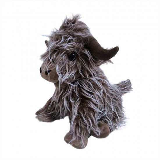 A plush stuffed animal shaped like a shaggy Highland cow or goat, shown against a plain white background.
