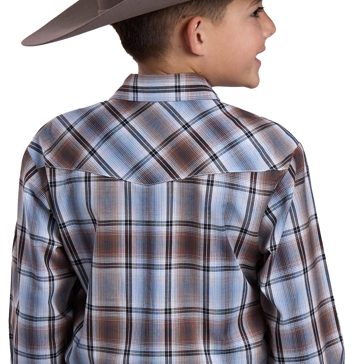 Child wearing a plaid shirt and cowboy hat on a white background