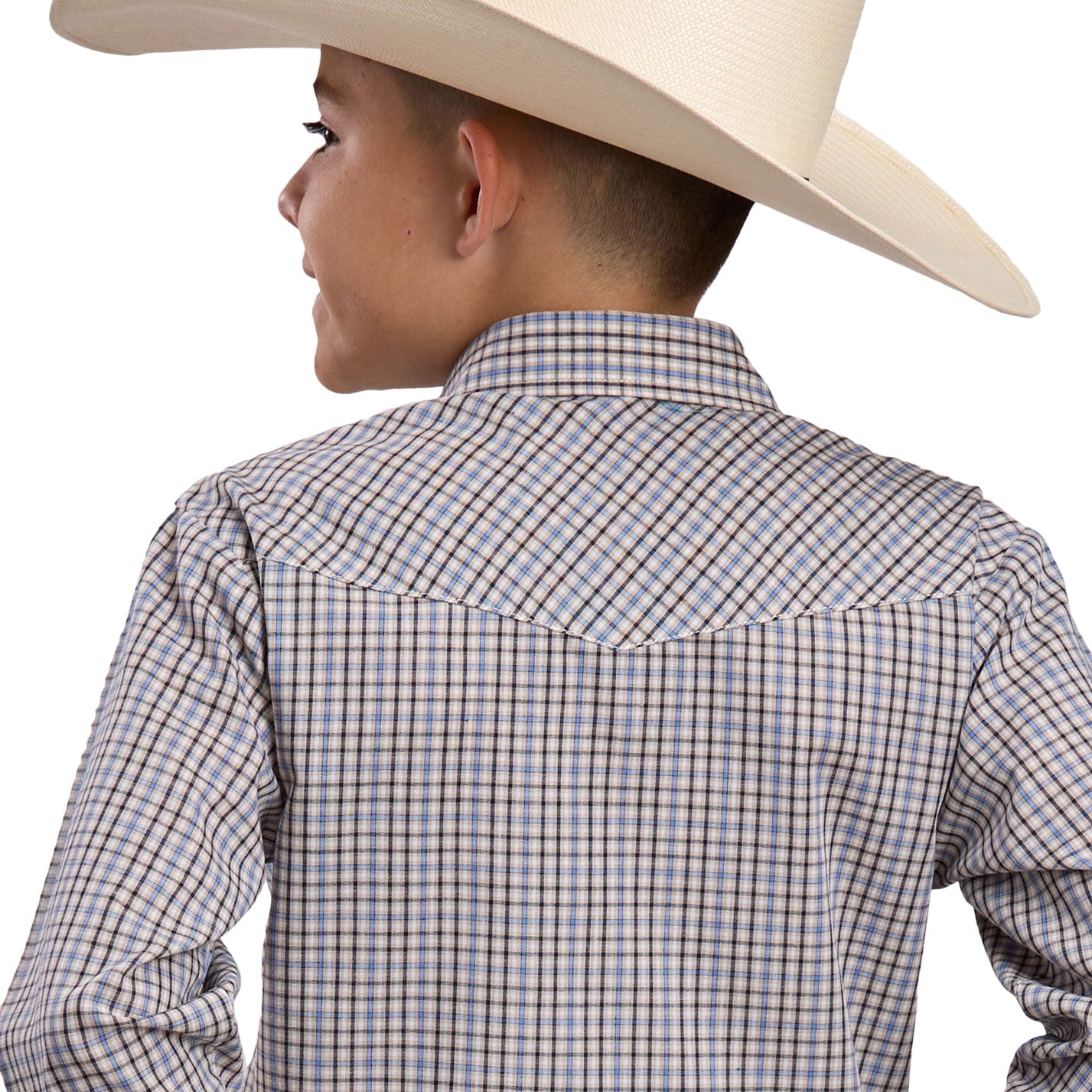 Child wearing a cowboy hat and plaid shirt on a white background