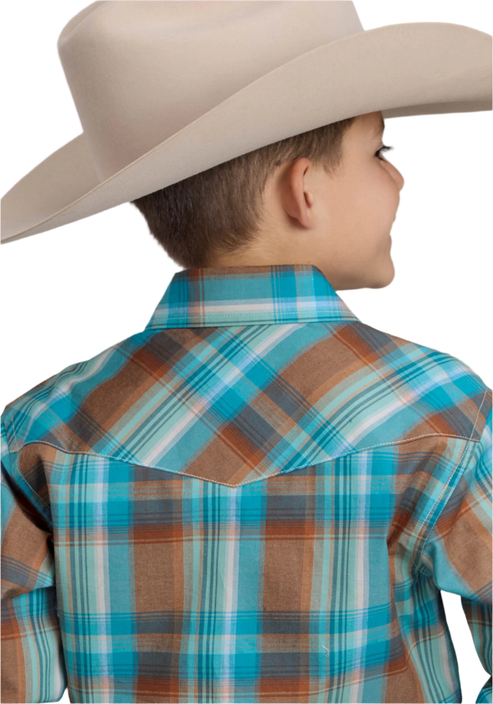 Roper Boy's Amarillo L/S Western Shirt. A boy wearing a long sleeve plaid western shirt with a snap front and two pockets, complemented by a cowboy hat and a belt with a silver buckle.