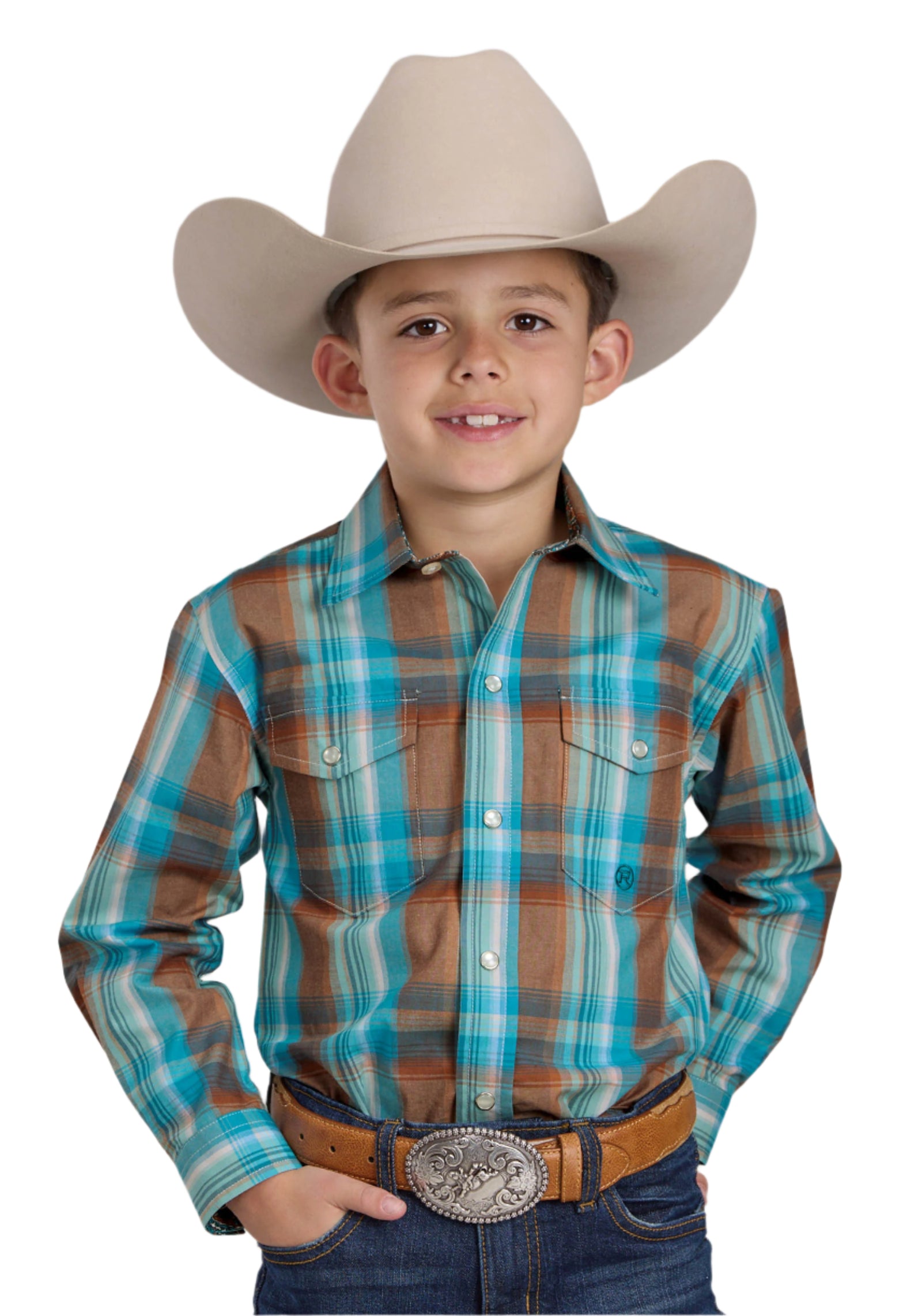 Roper Boy's Amarillo L/S Western Shirt. A boy wearing a long sleeve plaid western shirt with a snap front and two pockets, complemented by a cowboy hat and a belt with a silver buckle.