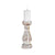 Hand Carved Candleholder. Decorative candle holder with a white candle on a white background