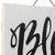 Handcrafted Monochrome Bless Our Nest Wallart. Decorative sign with 'Bless our nest' text on a white background