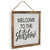 Handcrafted Welcome Sh*t Show Framed Wall Art. Wooden sign with text 'Welcome to the Shitshow' on a white background