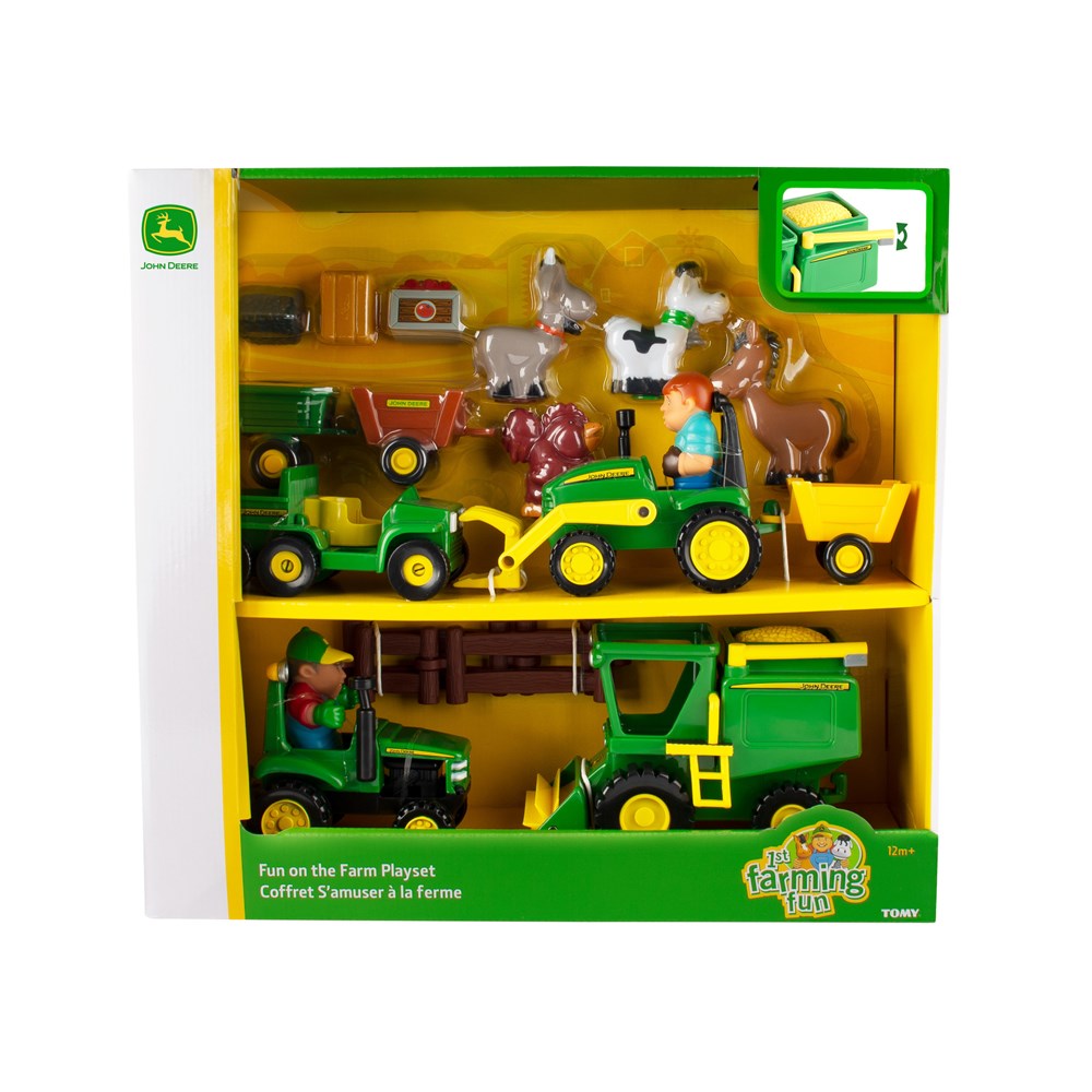 Toy farm playset packaging with various farm vehicles and animals on a yellow background.