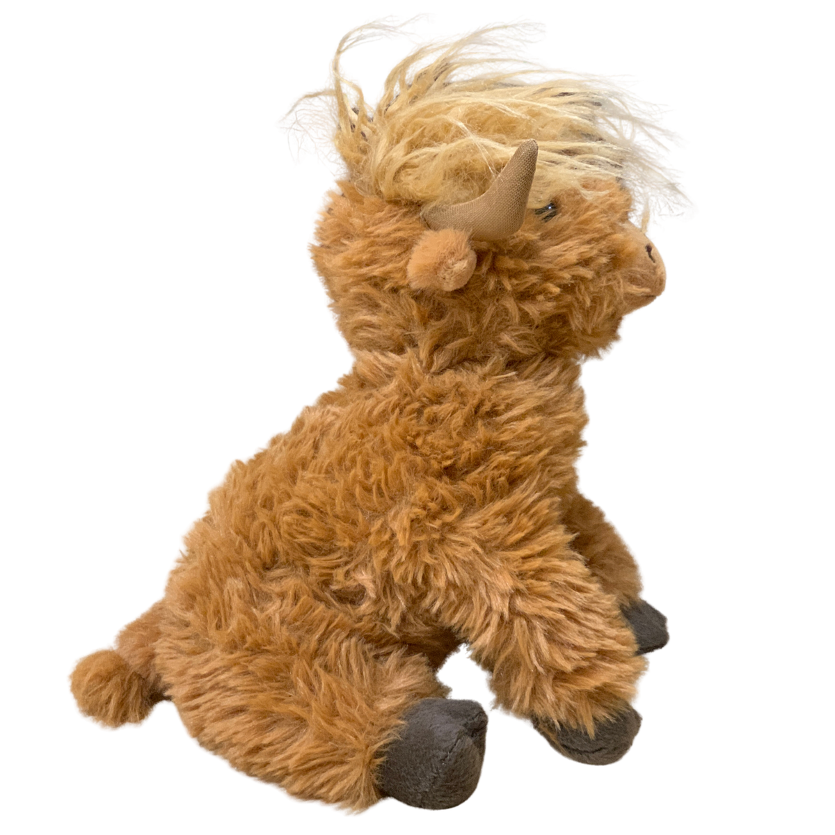 Plush toy of a brown yak on a white background