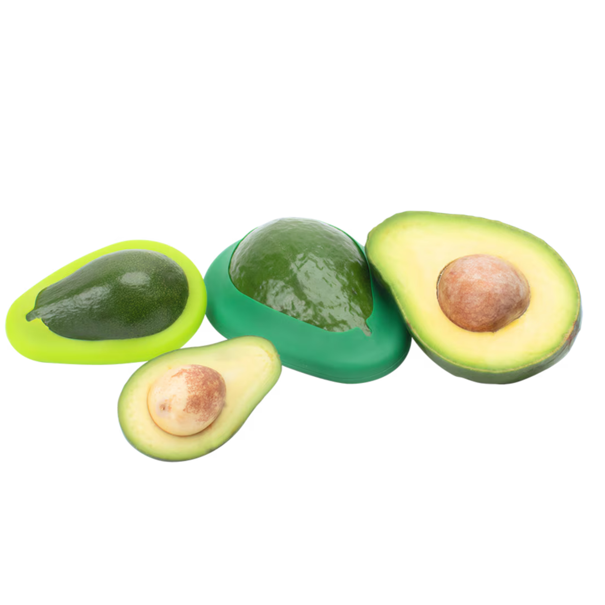 Three avocado-shaped silicone accessories in different green shades, including one whole avocado, one halved with pit exposed, and one halved with flesh side up, on a plain white background.