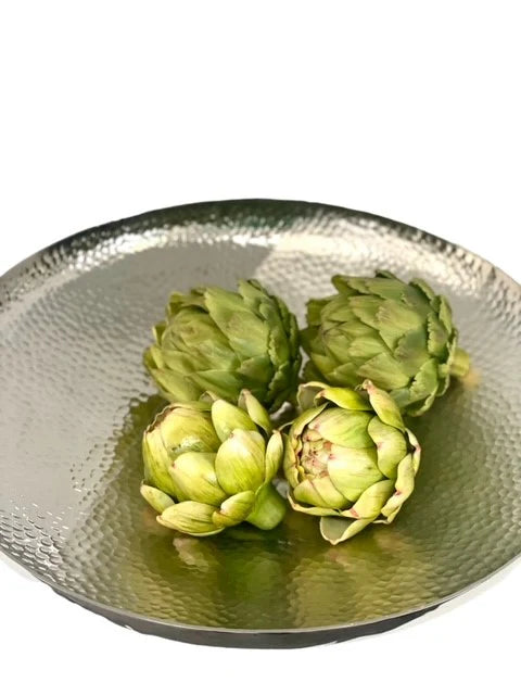 Hammer Centre Piece Bowl. Decorative silver bowl with artichokes on a white background