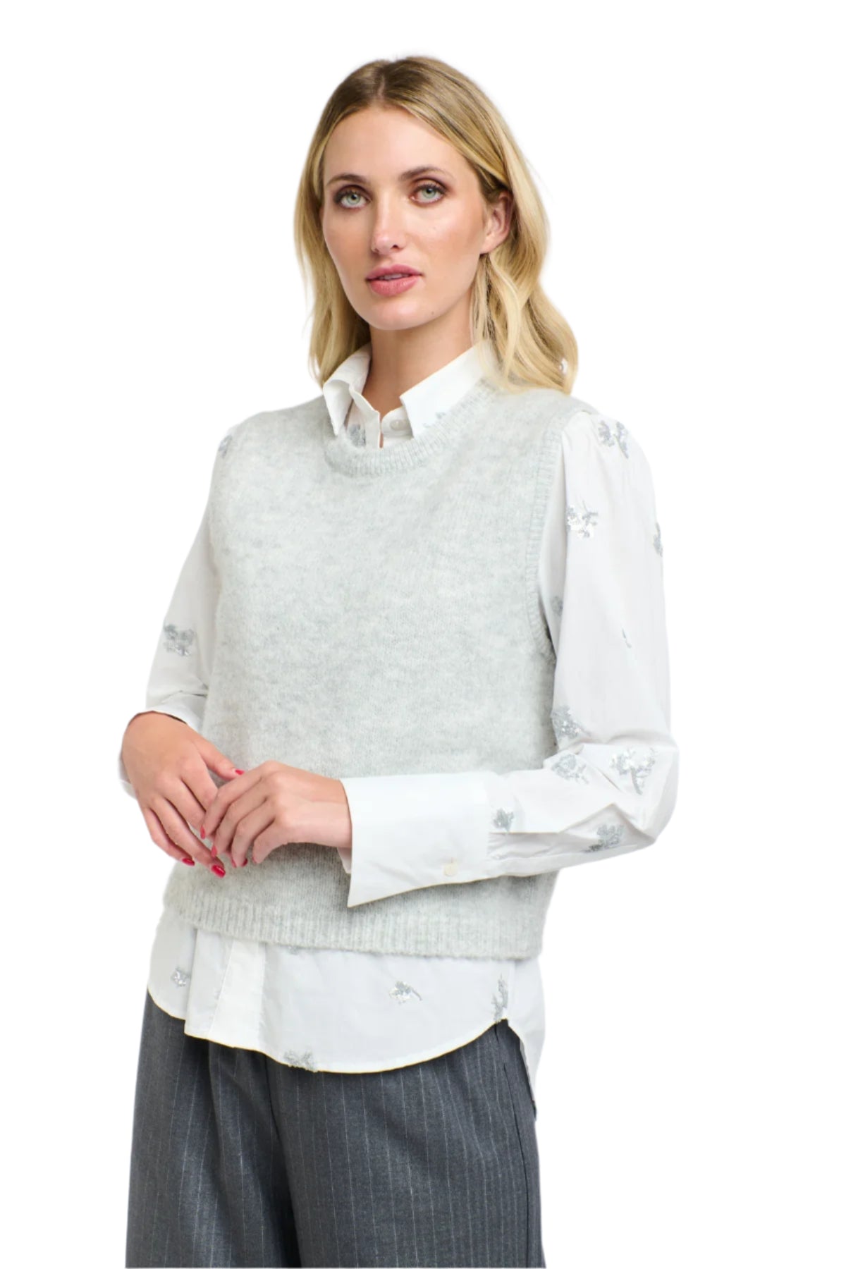 Woman wearing a 365 Women's Penelope Sequins Shirt. A light gray sweater over a white shirt with a plain background. 
