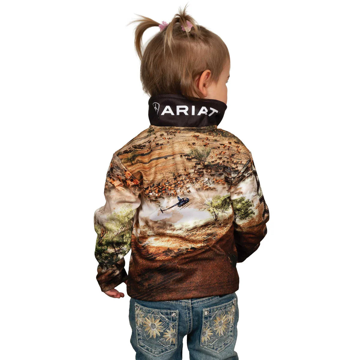 Ariat Kids Helimustering Fishing Shirt. Child wearing a camouflage-patterned shirt with a graphic design on a white background