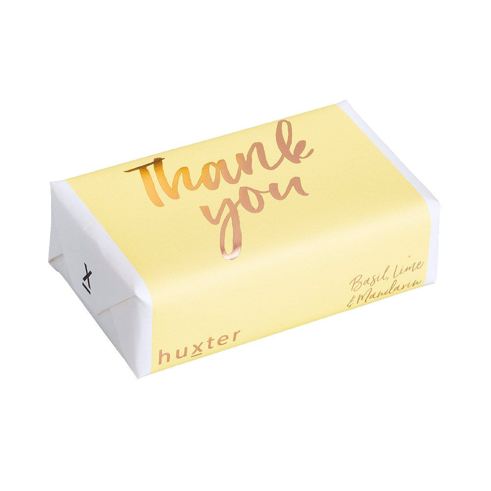 Huxter Thank You Lemon Rose Gold Soap. A bar of soap with 'Thank you' written in cursive on a rose gold foil stamp, with the brand name 'huxter' at the bottom.