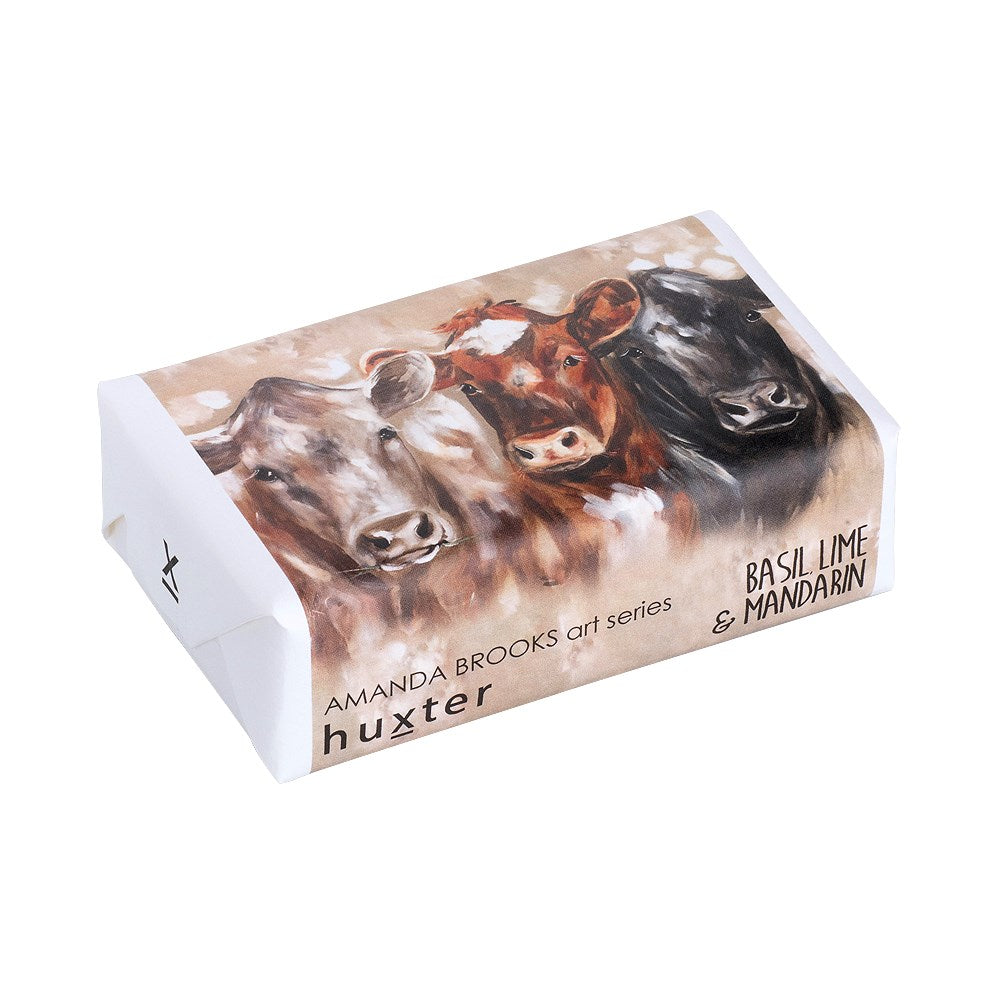 Huxter 	 AB 'Triple blessings' - Cows Soap. Product packaging with cow illustration and branding on a white background