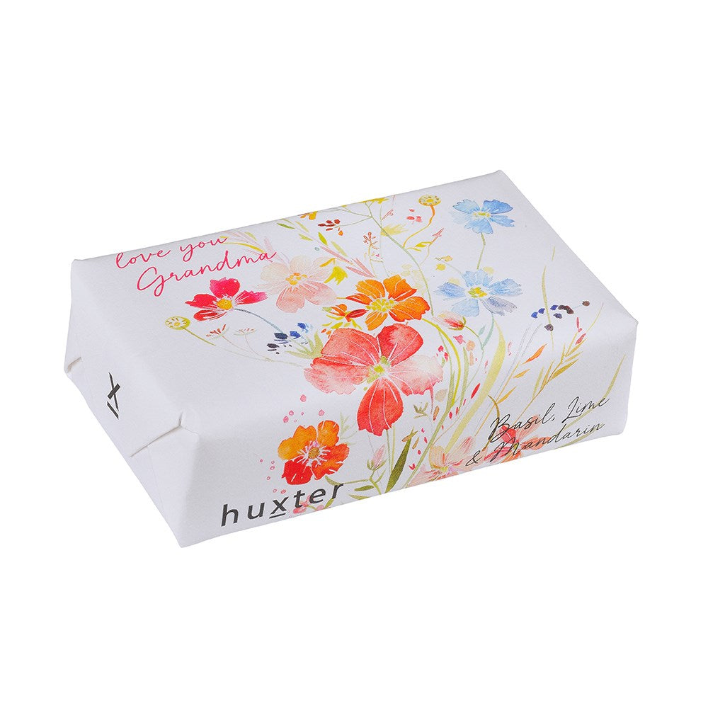 Huxter Love You Grandma Soap. A packaged bar of soap with a floral design and the text 'Love you Grandma' on the top, alongside the brand name 'huxter'.