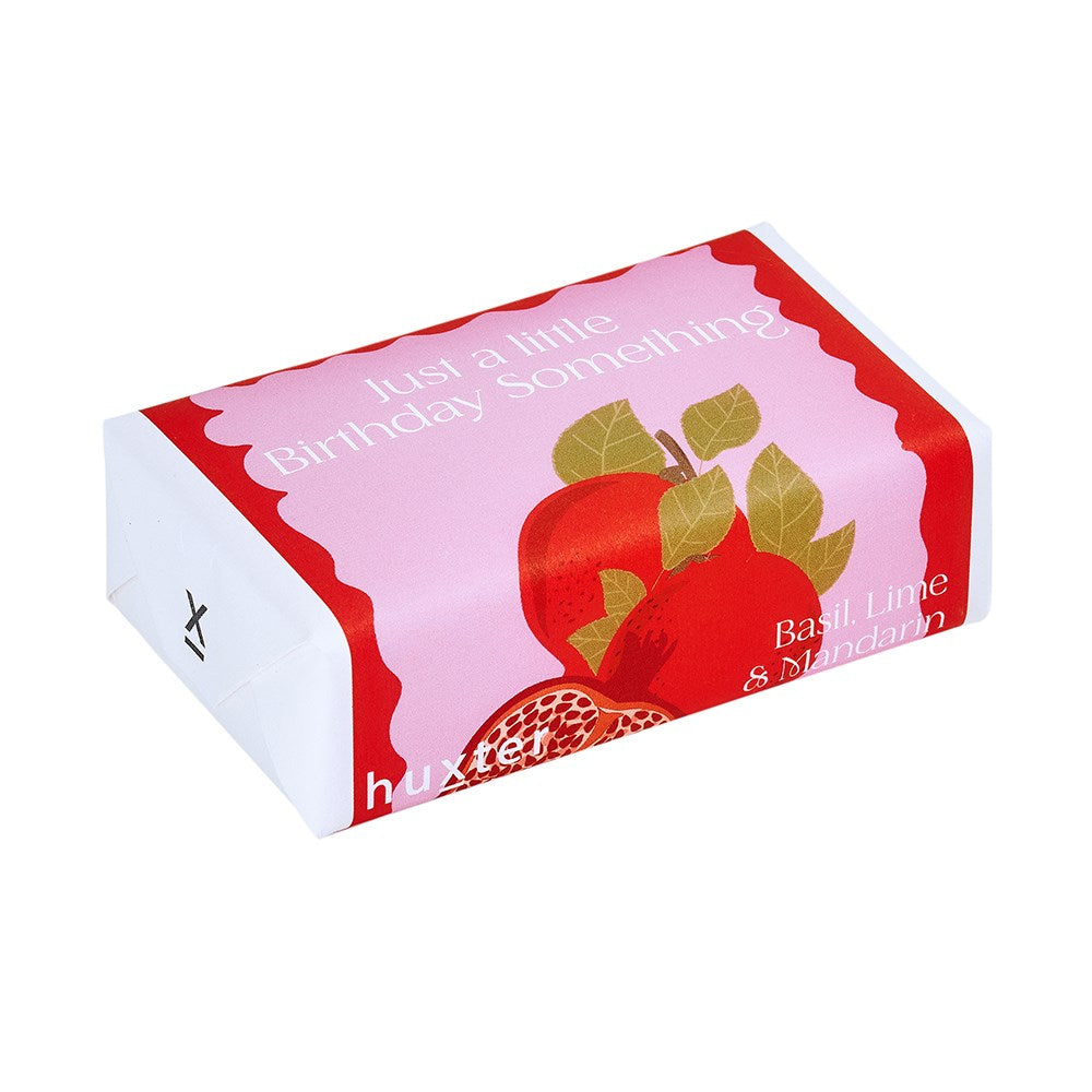 Rectangular box with a red apple design and text on a white background
