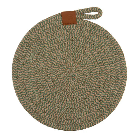 Nash Green Set of 2 Trivets. Round woven trivet with a brown handle on a white background