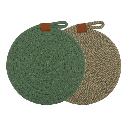 Nash Green Set of 2 Trivets. Two round woven trivets with brown straps on a white background