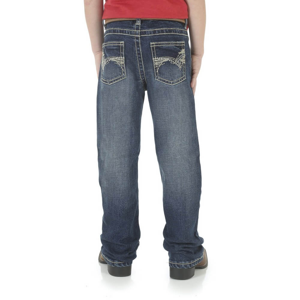 A pair of Wrangler Boy's 20X Vintage Boot Cut Jeans, featuring a slim fit and traditional 5-pocket design.