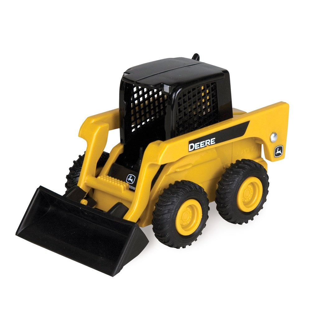 Toy skid steer loader with black bucket on a white background