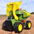John Deere 46cm Motorised 'Lights & Sounds' 2-n-1 Dig & Dump Rig. Toy dump truck with yellow and green colors on a dirt background