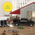 John Deere 1:32 Weathered Barn Play Set. Toy truck with trailer and horses near a barn in a playset.