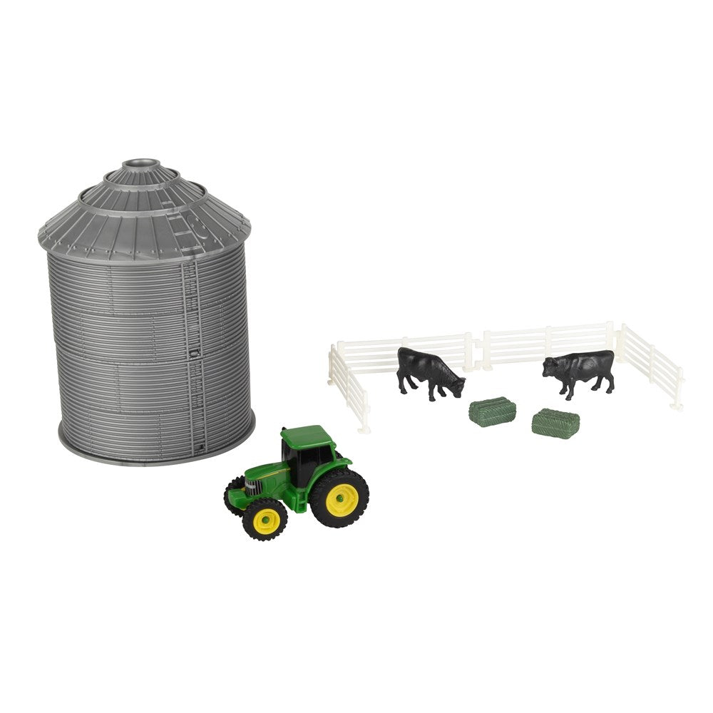 John Deere  1:64 JD Mini Grain Bin Set. Toy tractor, silo, and cows on a white background
