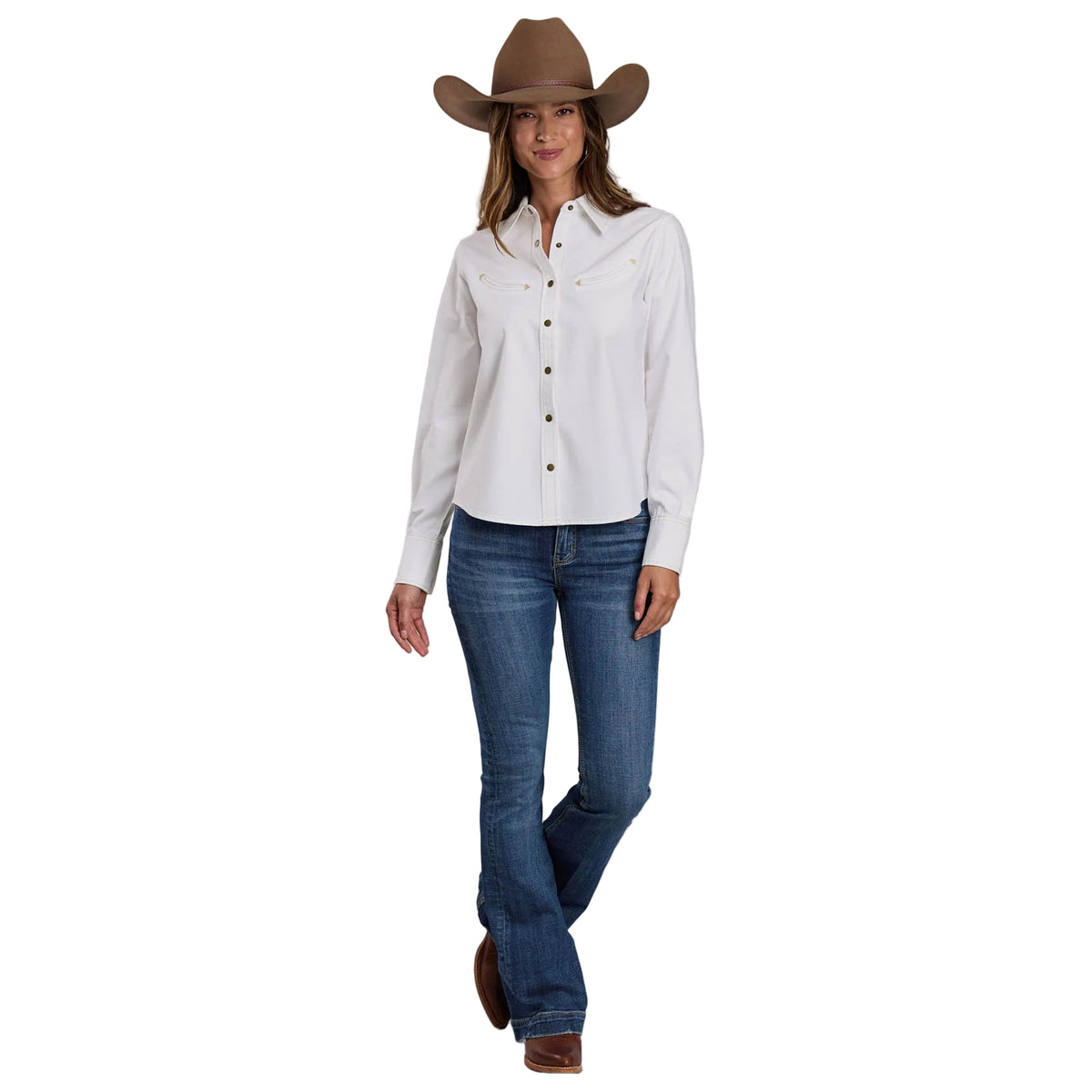 Woman wearing a white shirt, blue jeans, and a brown cowboy hat on a plain background