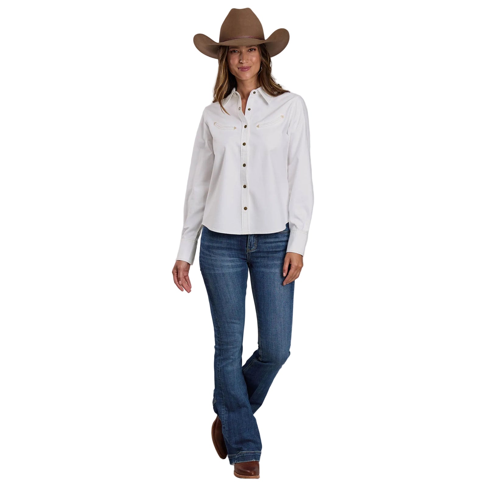 Woman wearing a white shirt, blue jeans, and a brown cowboy hat on a plain background
