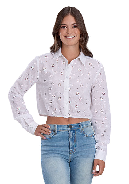 Roper Women's Five Star L/S Western Shirt. Woman wearing a white embroidered shirt and blue jeans on a gray background