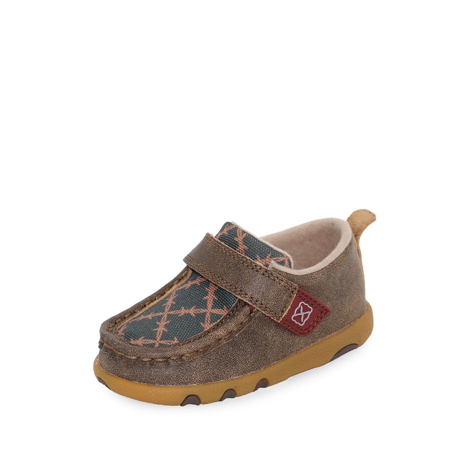 Twisted X Infants Barb Casual Moc. An infant casual moc shoe with a brown base color and a blue pattern on the upper, featuring a hook and loop closure and a red Twisted X logo.
