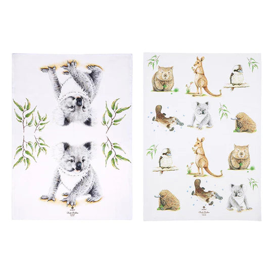 Bush Buddies Koala 2pk Kitchen Towel. Two kitchen towels with illustrations of Australian animals such as koalas, kangaroos, and wombats, along with foliage, on a white background.