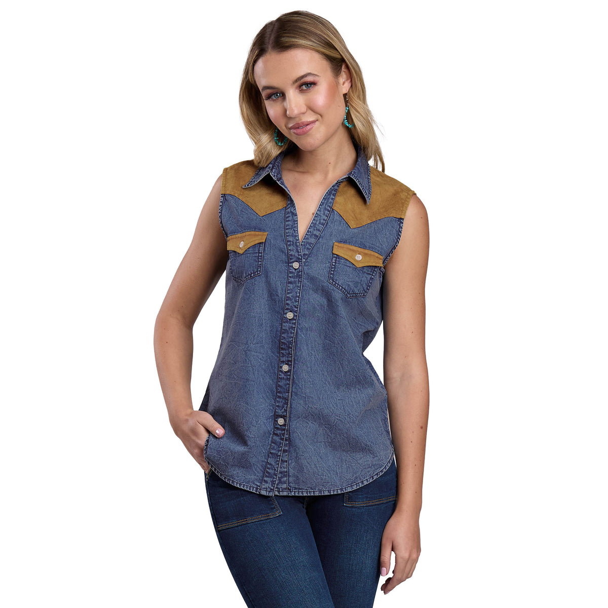Woman wearing a blue denim shirt with brown accents on a white background
