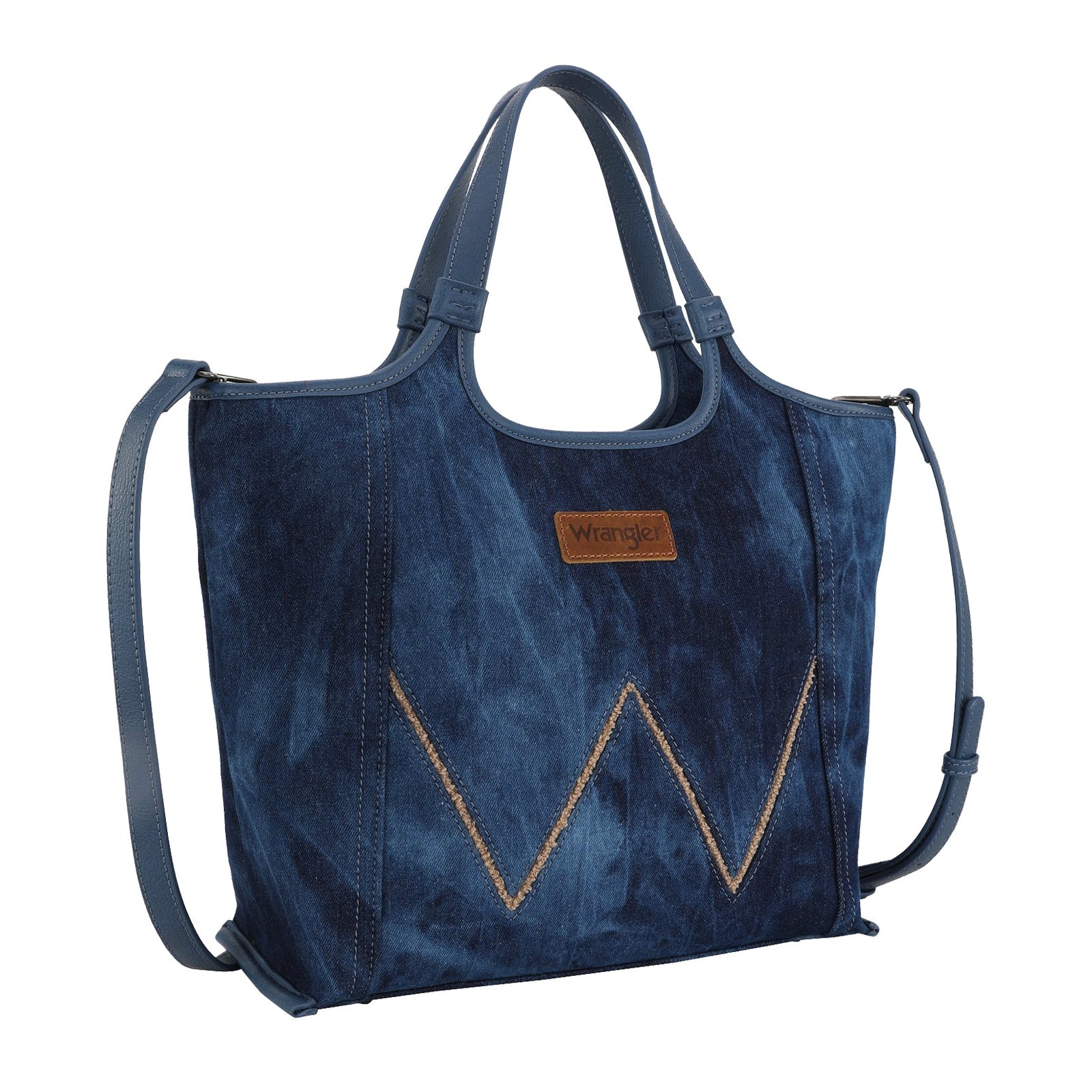 Wrangler Dark Denim Willa Tote Bag. Blue denim tote bag with a brand label on a white background