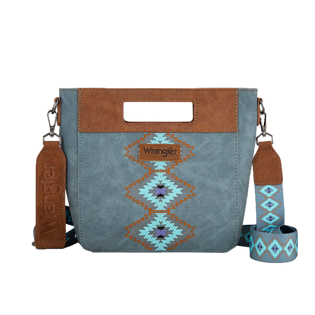 Wrangler Inez Embroidery Bag. Blue bag with brown handle and strap, featuring geometric patterns on a white background