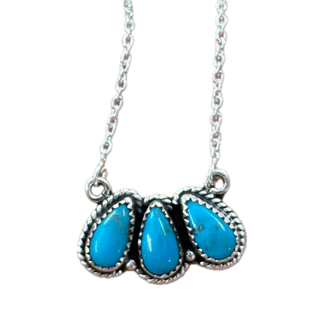 Wild Brumby Co High Country Trio Necklace. Necklace with three turquoise stones on a white background