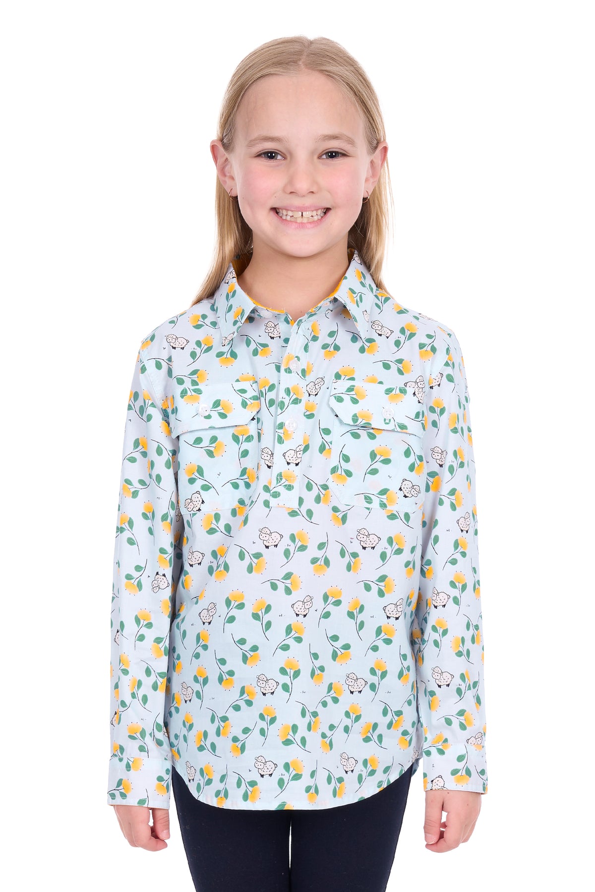 Young girl wearing a floral patterned shirt on a white background